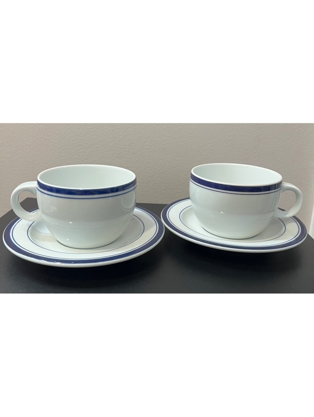Crate and Barrel blue rim cup and saucer set
